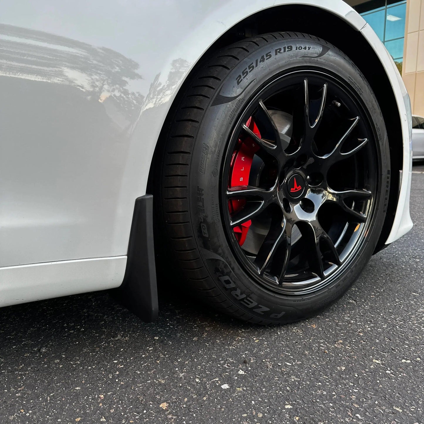 Model S Long Range + Plaid Mud Flaps